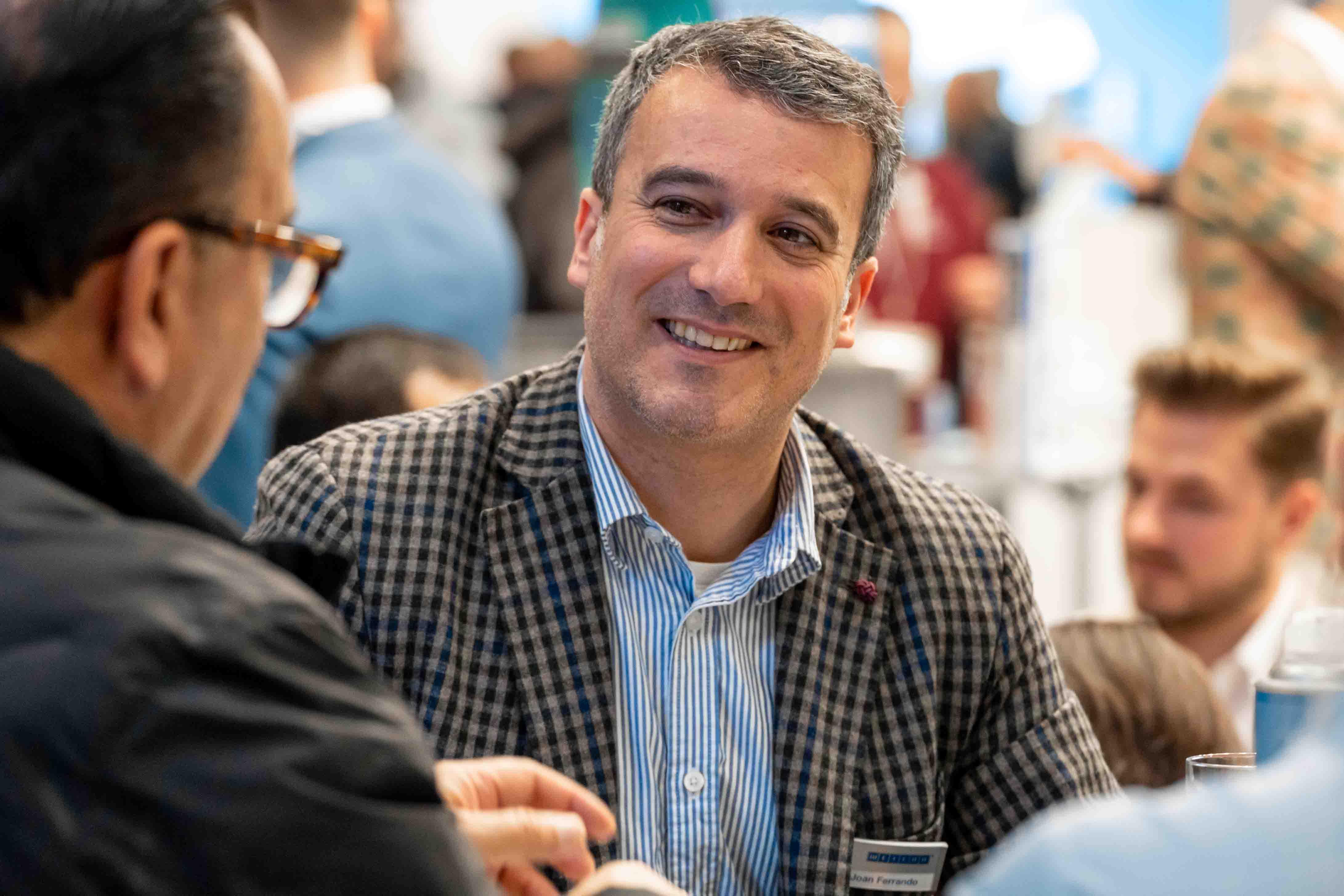 man, smiling, blazer, checkered, shirt